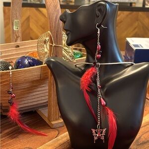 Fun and flirty feather and butterfly pendant necklace with silver chain